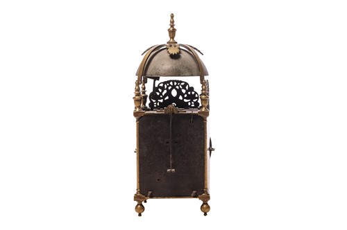 Lot 22 - A 30-hour brass lantern clock in a painted...