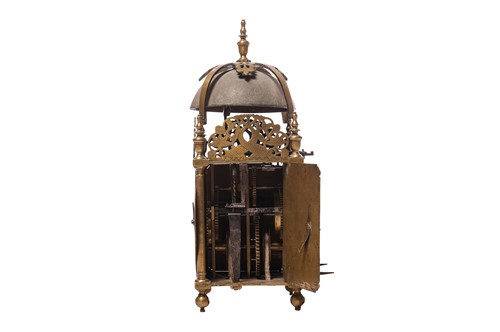 Lot 22 - A 30-hour brass lantern clock in a painted...
