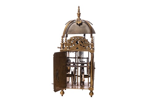 Lot 22 - A 30-hour brass lantern clock in a painted...