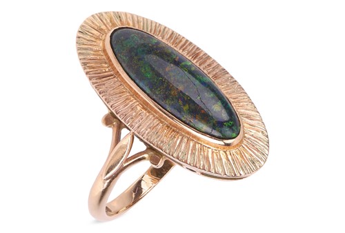 Lot 45 - A matrix opal dress ring in 9ct gold,...