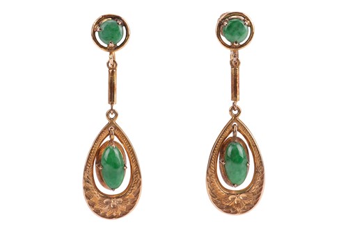Lot 46 - A pair of jade drop earrings, each containing...