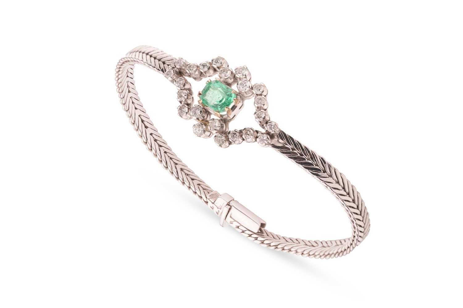 Lot 176 - An emerald and diamond-set cluster bracelet,...