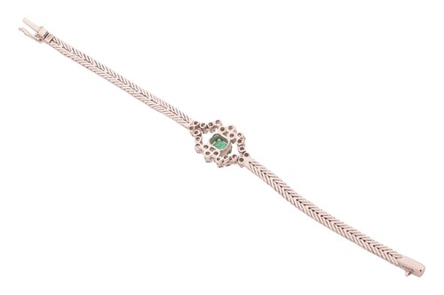 Lot 176 - An emerald and diamond-set cluster bracelet,...