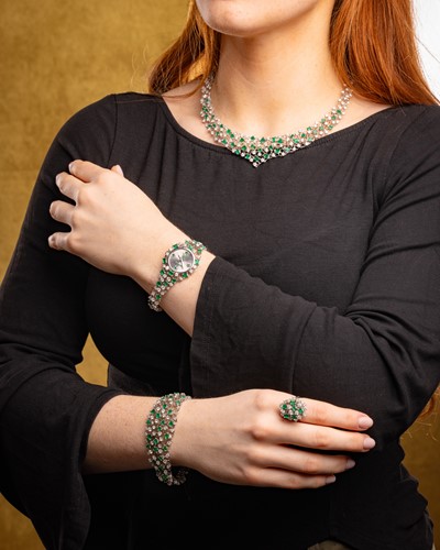 Lot 180 - Augustin Julia-Plana - a diamond and emerald...