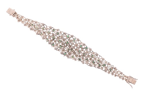 Lot 180 - Augustin Julia-Plana - a diamond and emerald...