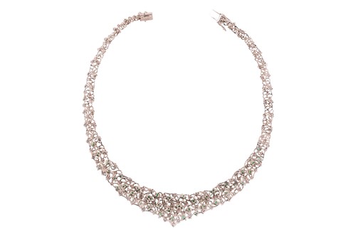 Lot 180 - Augustin Julia-Plana - a diamond and emerald...