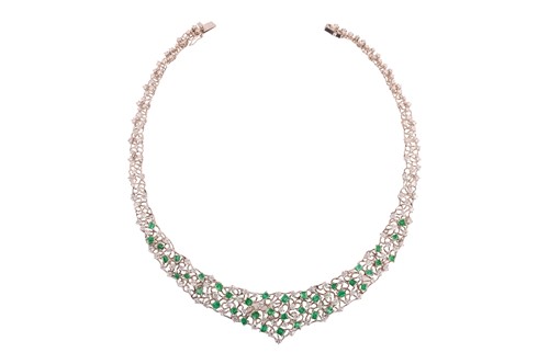 Lot 180 - Augustin Julia-Plana - a diamond and emerald...
