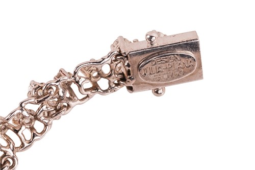 Lot 180 - Augustin Julia-Plana - a diamond and emerald...