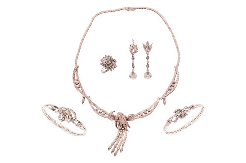 Lot 177 - A diamond-set foliate ensemble containing a...