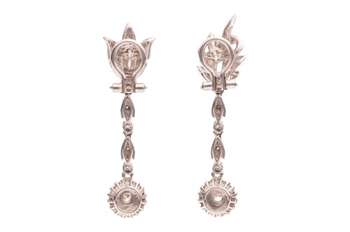 Lot 177 - A diamond-set foliate ensemble containing a...