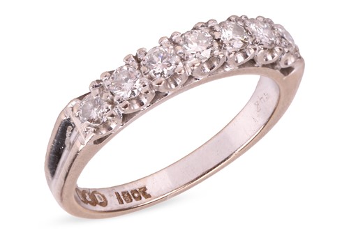 Lot 82 - Boodle & Dunthorne - a diamond half eternity...
