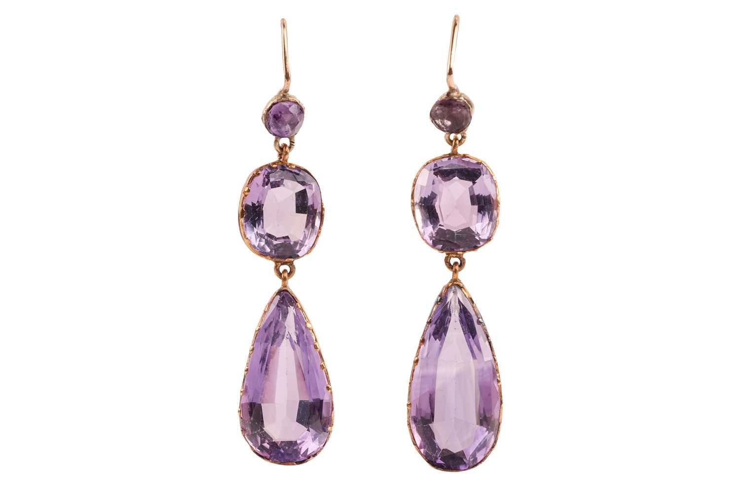 Lot 4 - A pair of amethyst pendant earrings; the...