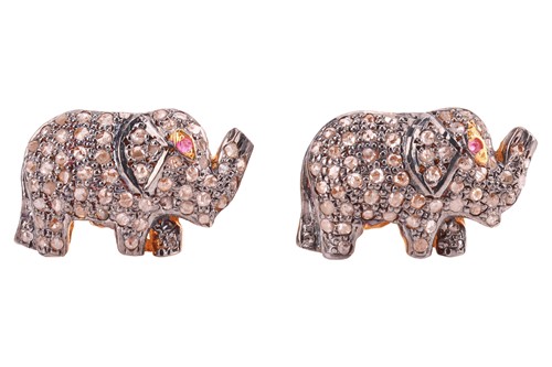 Lot 143 - A pair of diamond-set elephant cufflinks, the...