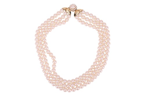 Lot 74 - A three-row cultured pearl necklace,...