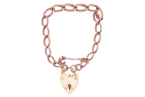 Lot 47 - A 9ct gold chain bracelet with heart padlock,...