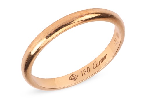 Lot 164 - Cartier - a wedding band, the plain polished D-...