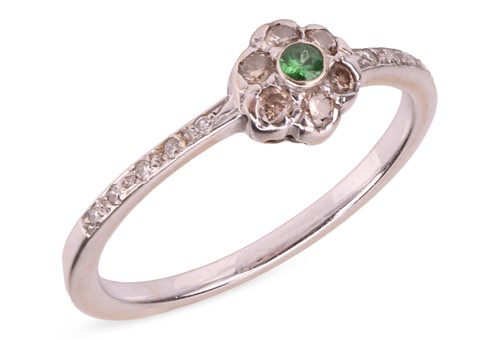 Lot 71 - A gem-set daisy ring, composed of a central...