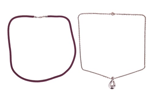 Lot 136 - Fred of Paris - a diamond-set drop pendant, of...