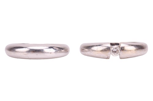 Lot 109 - Two rings; comprising a tension-set diamond...