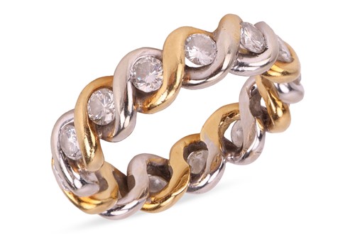 Lot 175 - A diamond-set full eternity ring, of twisted...