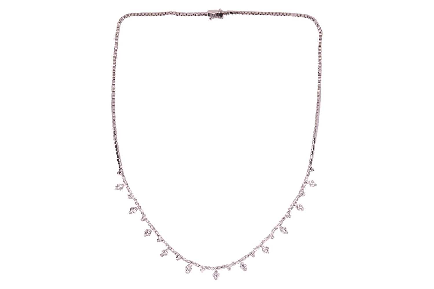 Lot 79 - A diamond-set fringe necklace, composed of...