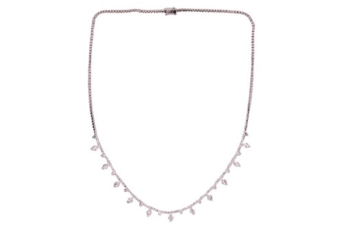Lot 79 - A diamond-set fringe necklace, composed of...