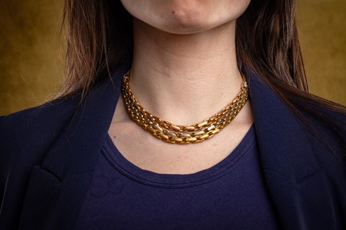 Lot 158 - A three-tone fancy chain necklace, comprising...