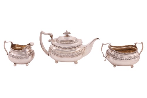Lot 351 - A George III silver three-piece tea service,...