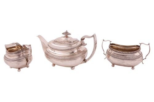 Lot 351 - A George III silver three-piece tea service,...