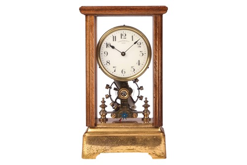 Lot 110 - A 1906 electro-magnetic brass mantel clock, by...