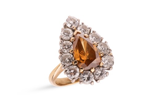 Lot 35 - A fancy deep brownish-yellow diamond cluster...