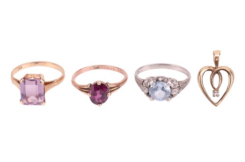 Lot 19 - Three gem-set rings and a heart pendant; to...