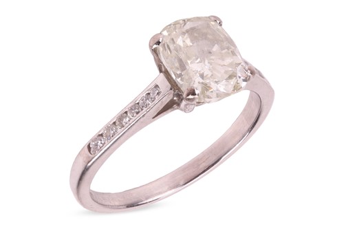Lot 186 - A diamond solitaire ring in 18ct white gold,...