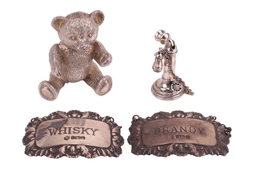 Lot 160 - A silver teddy bear figurine, a silver...