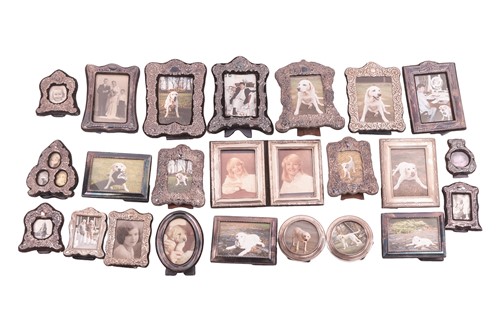 Lot 161 - Twenty three silver-mounted photo frames with...