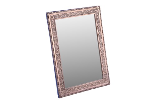 Lot 157 - A late Victorian silver-framed table mirror,...