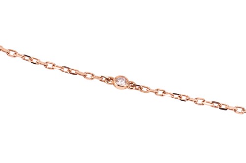 Lot 258 - Cartier - A diamond-set Double C de Cartier...