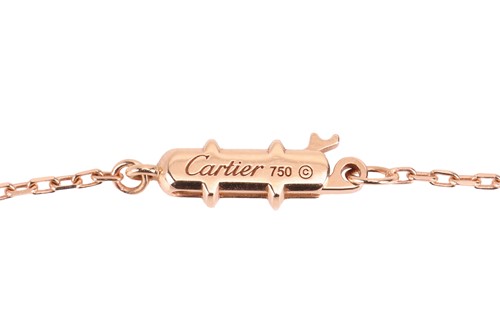 Lot 258 - Cartier - A diamond-set Double C de Cartier...