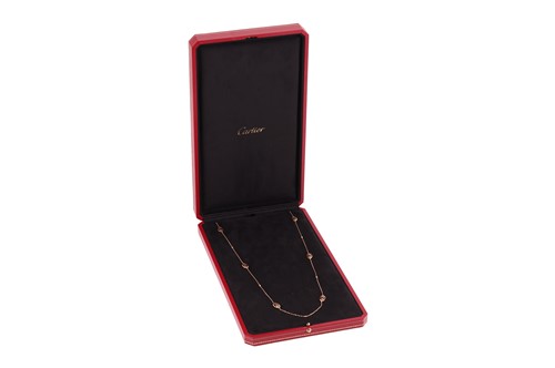 Lot 258 - Cartier - A diamond-set Double C de Cartier...