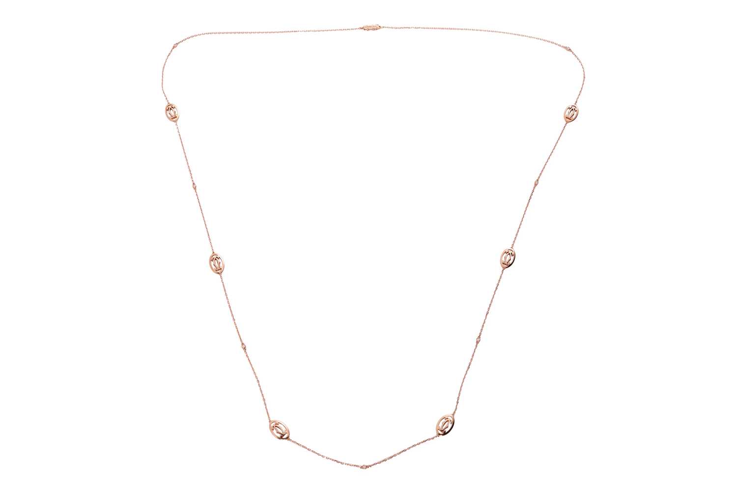 Lot 258 - Cartier - A diamond-set Double C de Cartier...