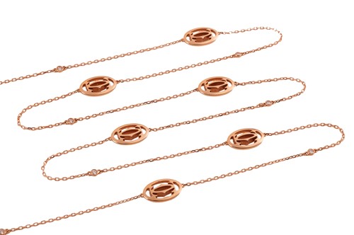 Lot 258 - Cartier - A diamond-set Double C de Cartier...