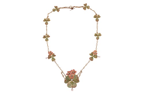 Lot 69 - An Art Nouveau shamrock plique-à-jour enamel...