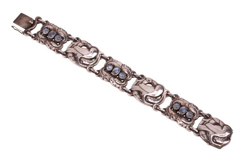 Lot 243 - Georg Jensen - a silver link bracelet set with...