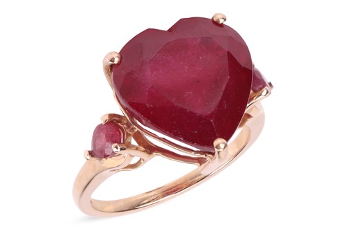 Lot 162 - A ruby ring, the heart-shaped glass-filled...