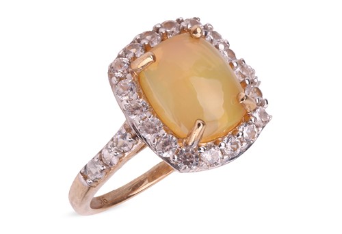 Lot 164 - An opal and diamond cluster ring, the...