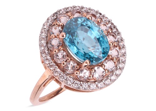 Lot 150 - A gem-set cluster ring in 9ct gold, the...