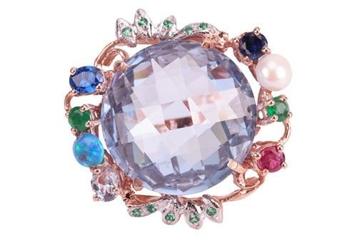 Lot 152 - A gem-set cocktail ring, centrally set with a...