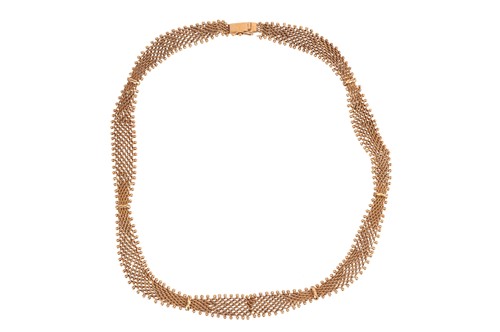 Lot 194 - An 18ct gold collar necklace, composed of...