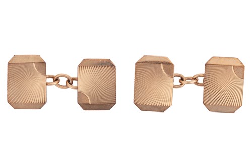 Lot 106 - A pair of 9ct gold cufflinks, the head of each...