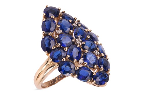 Lot 64 - A sapphire dress ring, the lozenge panel, claw-...